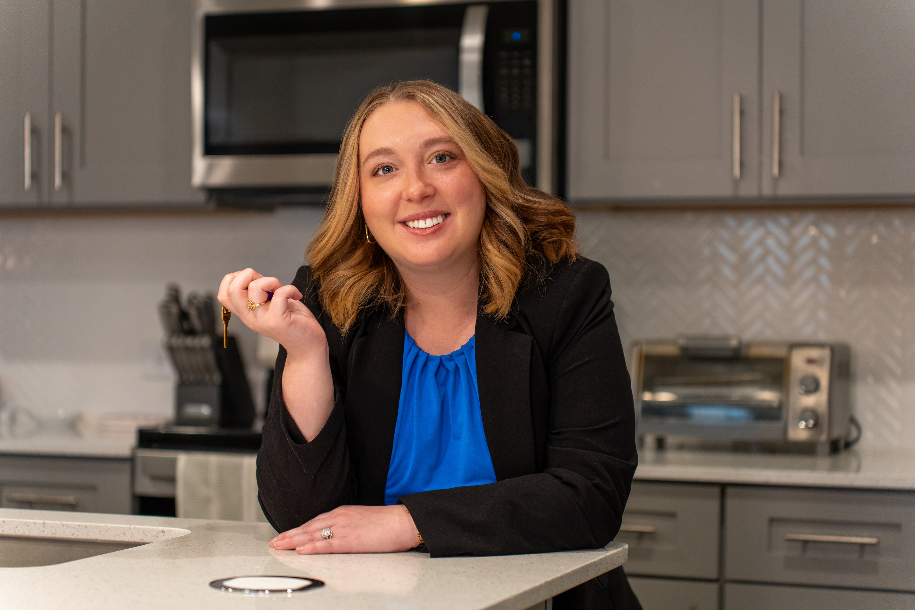 Emily with a featured home interior